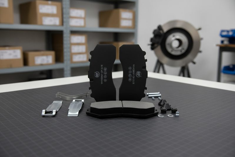 Measuring Foton brake pad thickness with digital caliper for fitment verification