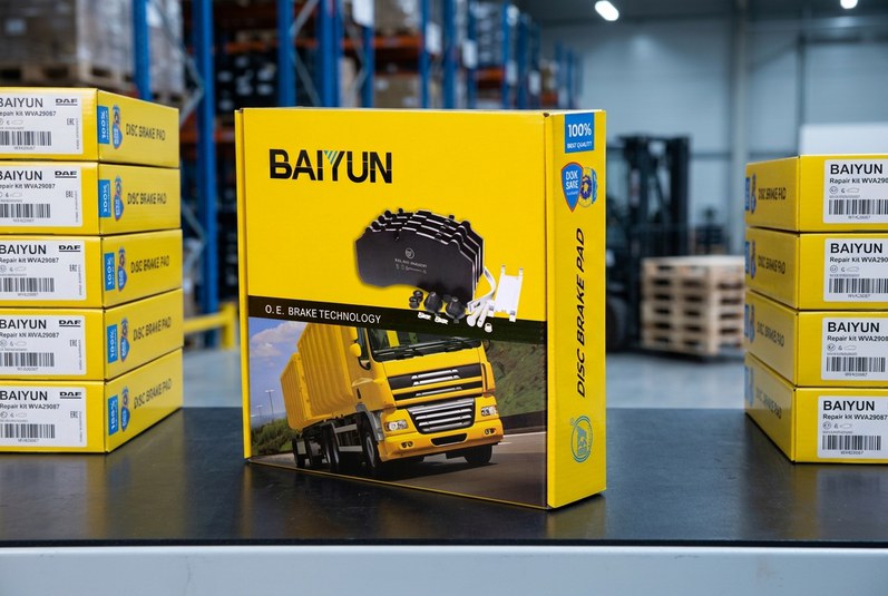 BAIYUN WVA29087 repair kit box for DAF disc brake pad fitment verification on warehouse shelf