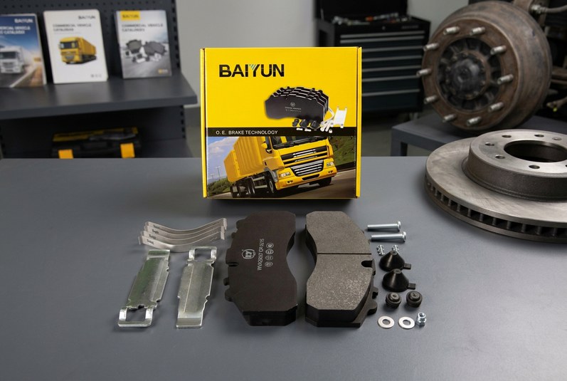 Heavy-duty commercial vehicle brake pad installed in caliper private label inspection