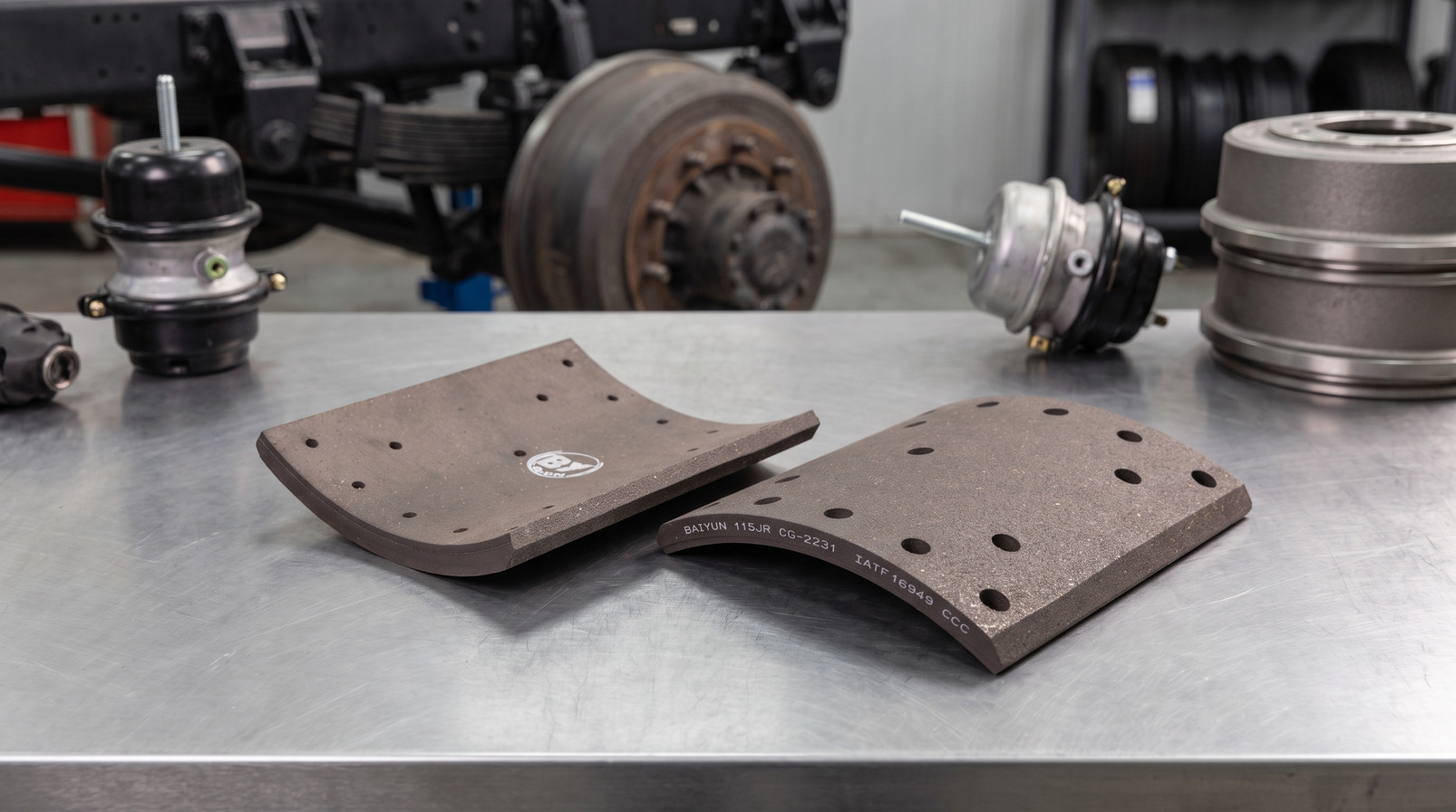 Brake Lining Compliance and Fleet Uptime Priorities Reshape Heavy-Duty Truck Brake Lining Materials Market - openPR.com - BAIYUN commercial vehicle brake pads in workshop scene