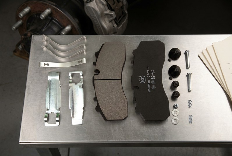 ECE R90 certified Chinese brake pad CP2219 on commercial vehicle workshop inspection bench