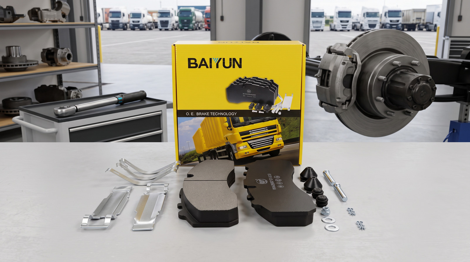 Quoted $1,270 for replacement of rear brakes (pads, rotors, and calipers). - Reddit: BAIYUN commercial vehicle brake pad set cp2219 next to heavy-duty air disc brake assembly in fleet workshop